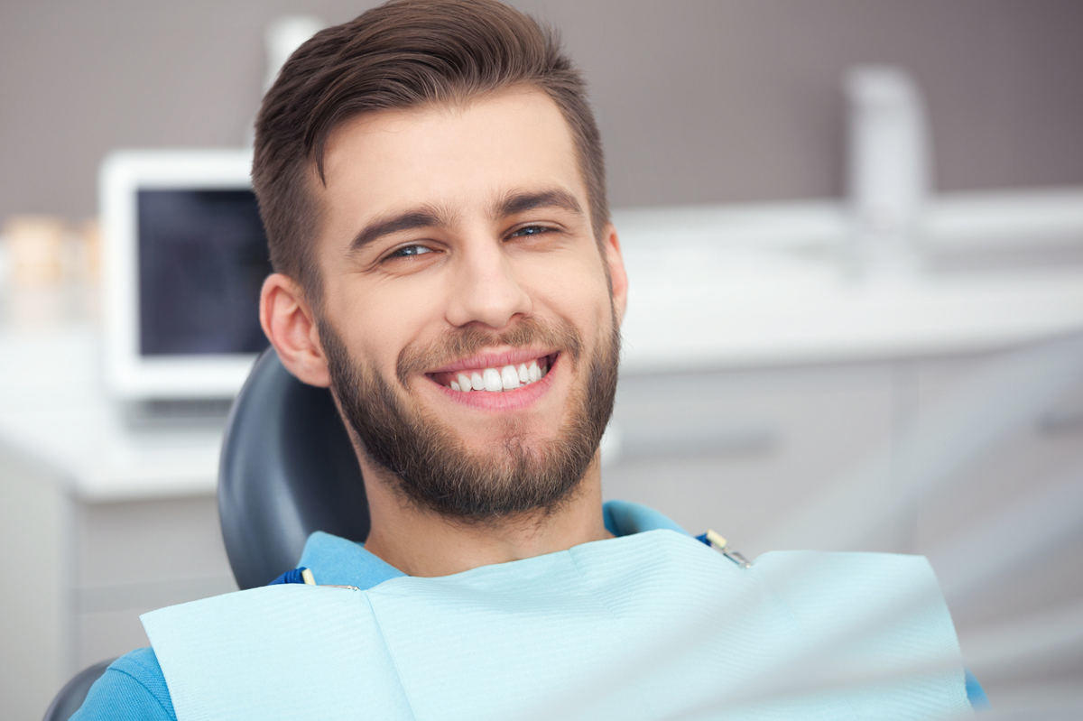 St. Louis man with dental implants smiling