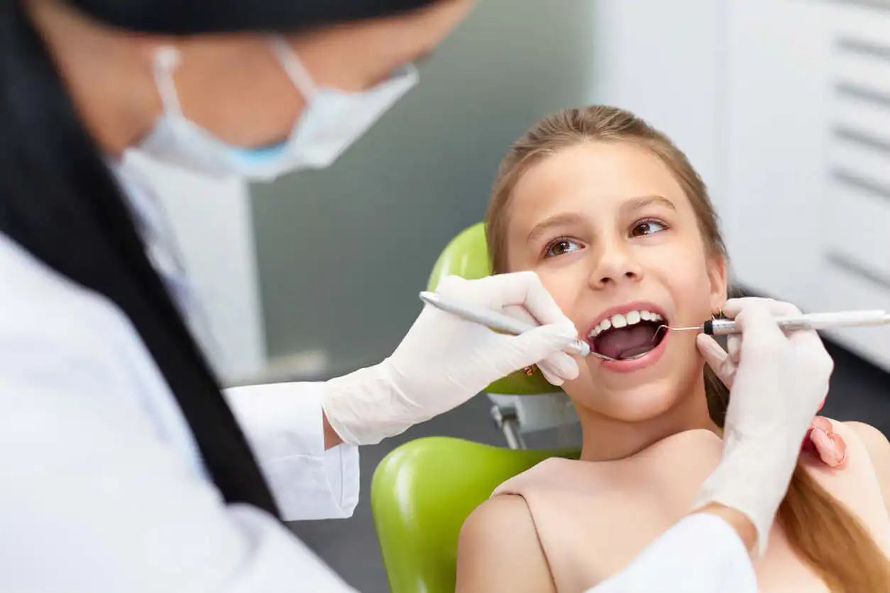 girl at dentist visit