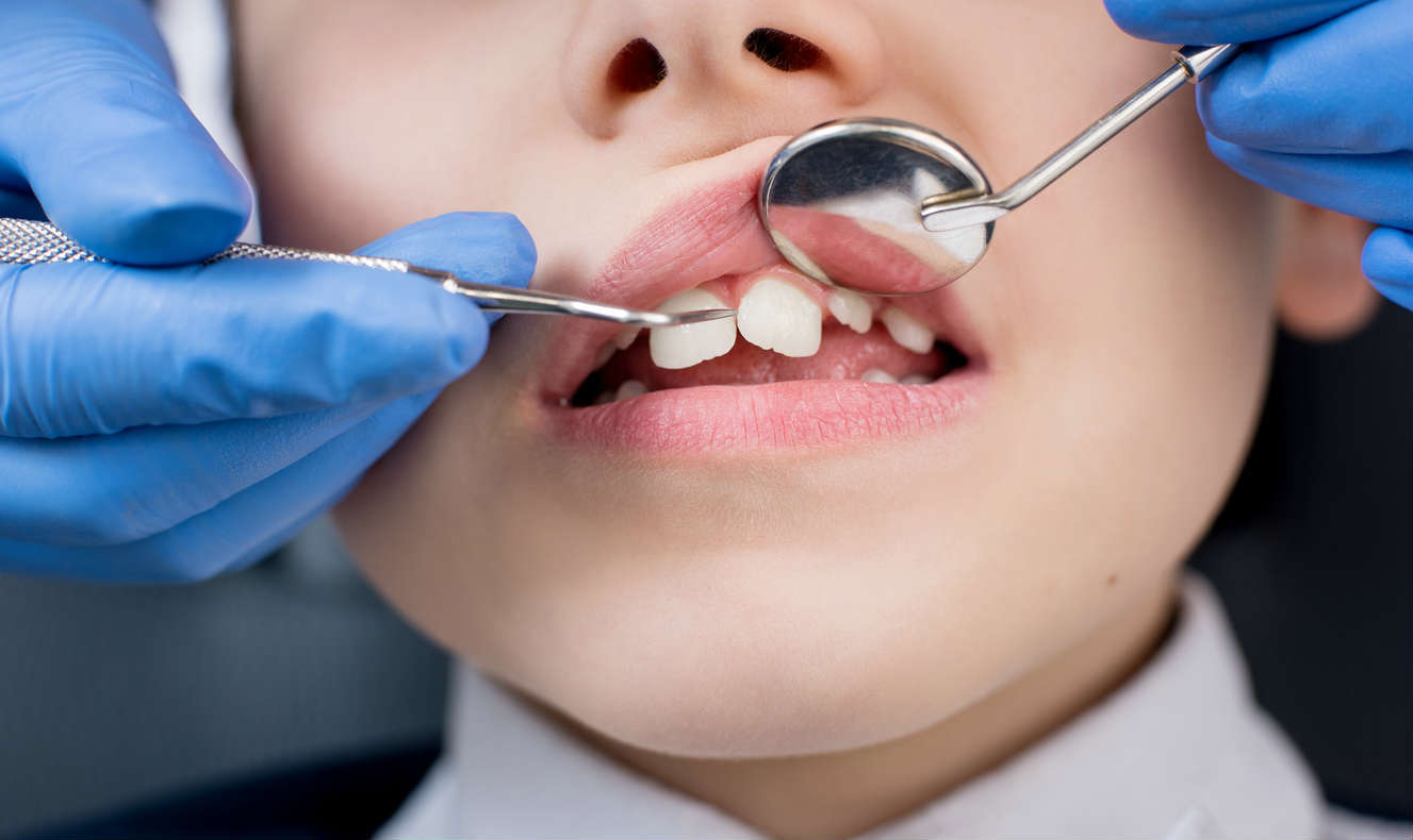 child with sensitive teeth