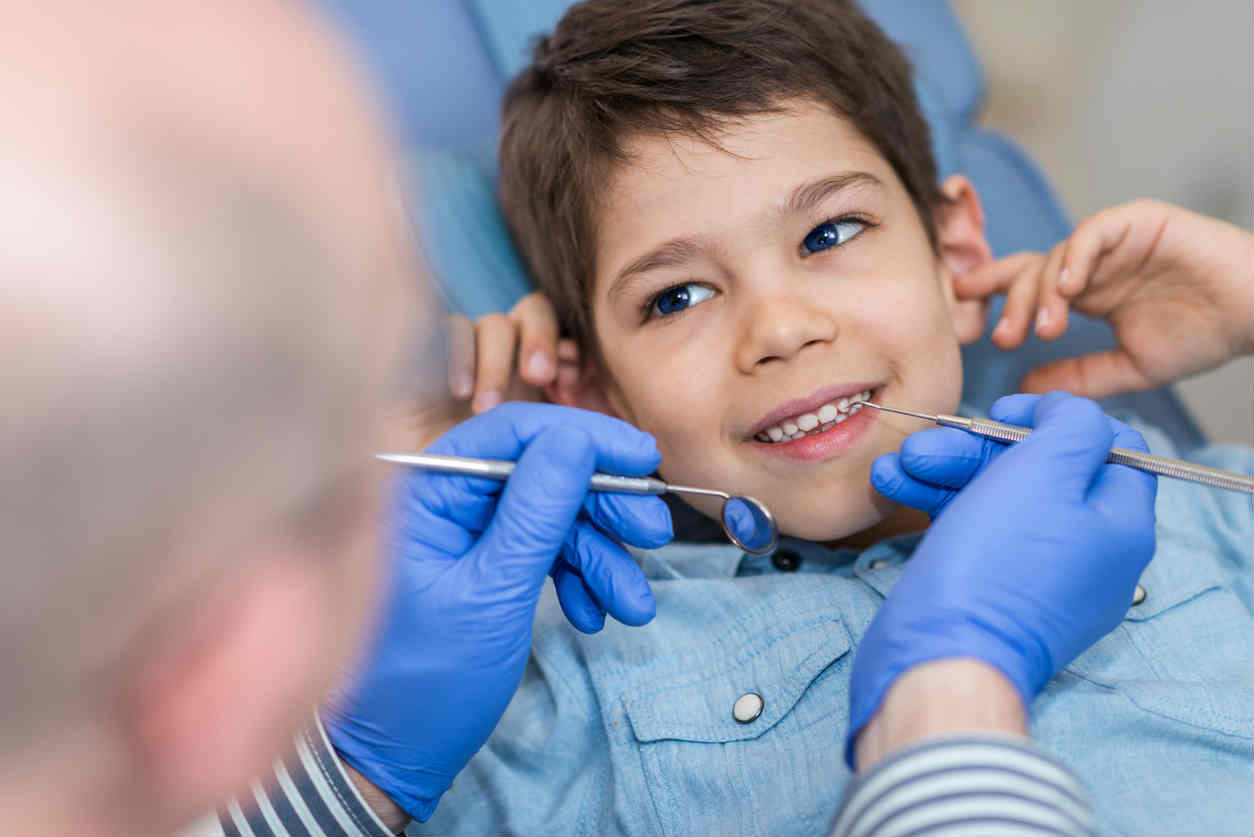 little boy at the dentist