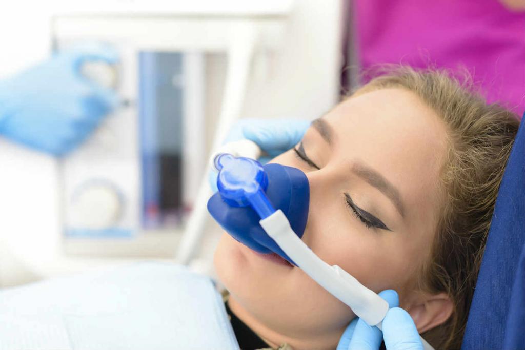 patient sedated at dentists office