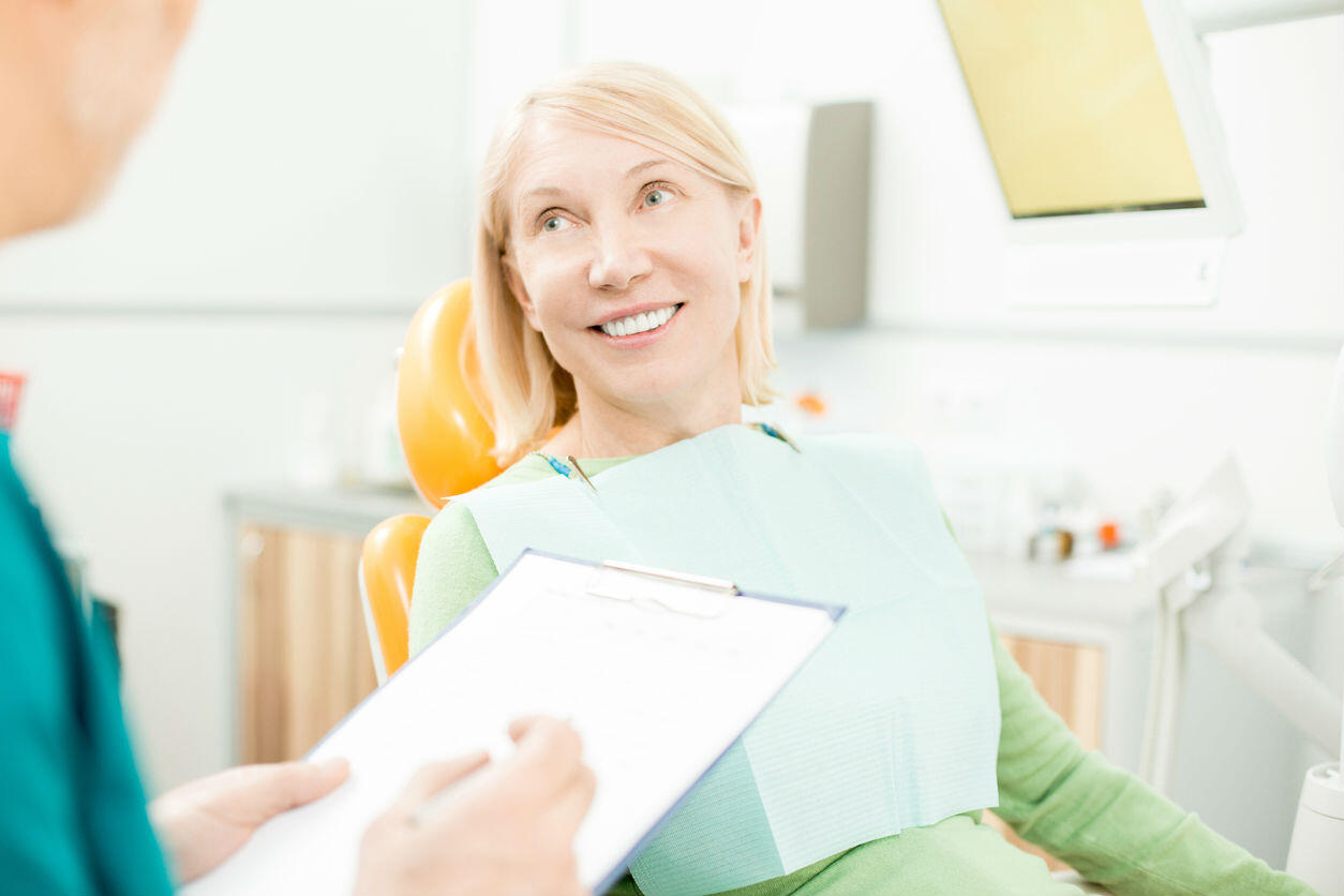 discussing medical history with dentist