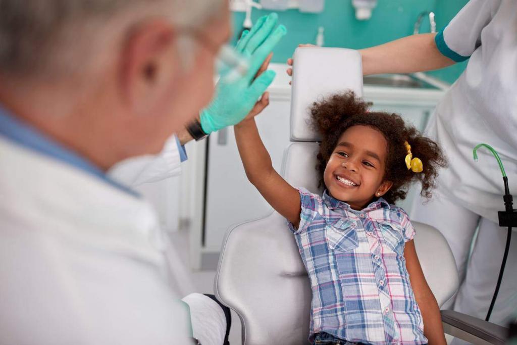 child with no cavities at dentist