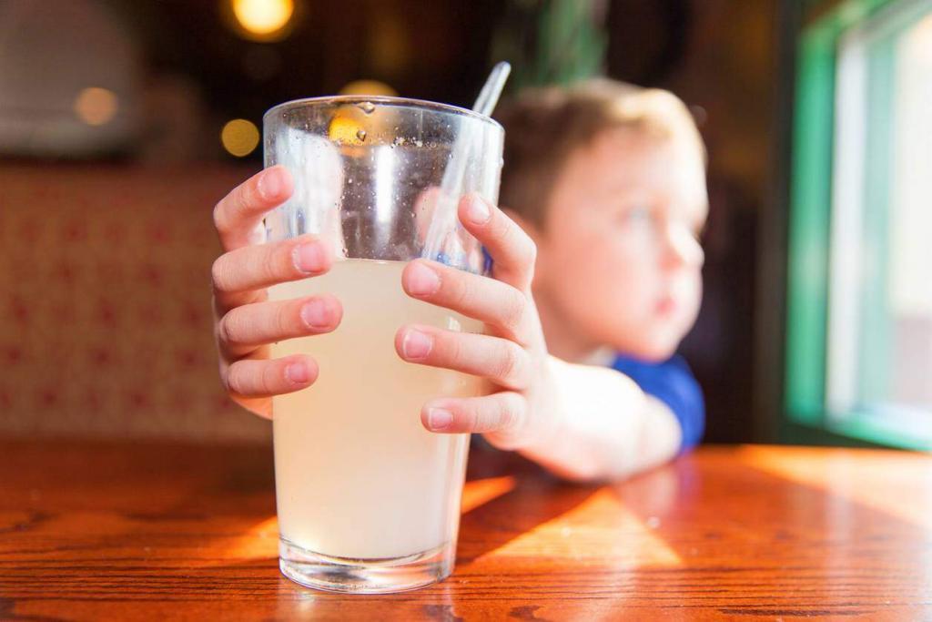 st. louis boy drinking lemonade