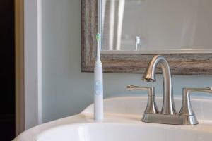 electric toothbrush on sink