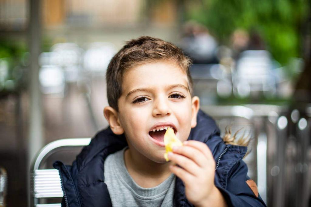 child eating chips